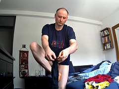 Kudoslong takes a shower in the morning, we watch as he washes his body and limp cock, then dries himself with a towel and gets dressed.