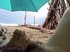Miss Creamy Teacher Gives Wet Handjob Under Beach Umbrella in Rain - Public Risky 4K