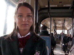 Saucy school dame is about to take off her clothes in the bus and have casual hookup