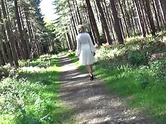 Naked Mature Lady Is Close To The Nature