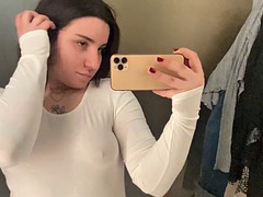 Sheer and mesh clothing tries on sexy tattooed alternative model