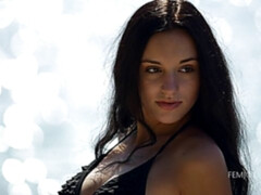 Cute-looking brunette Sasha C is showing off her naked pussy
