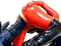 Nasty wife is wearing latex and fucking a humongous toy