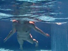 Naked Girl Is Swimming In The Pool