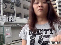 nubile asian redhead filmed while peeing on the street