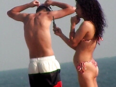 Hispanic fitness girl on the beach voyeur clip