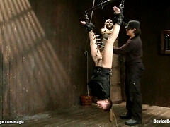 Bound In Straitjacket And Suspended