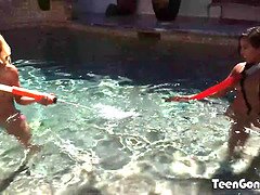 Hot brunettes Morgan Lee and Carmen Callaway swim in the pool and get wet and wild
