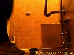 Young girl hunkering while pissing spied by camera