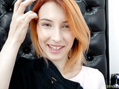 Redhead babe Elin Holm is touching her pussy with a sex toy