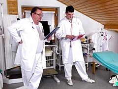 Filthy bitch Sharlotte Thorne examined and made to cum by 2 perverted doctors