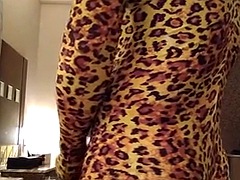 Japanese crossdresses  wearing leopard Morphsuit