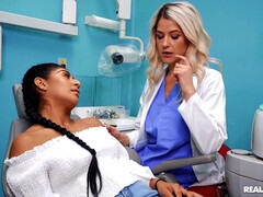 Gorgeous lesbian doctor seduces and fucks young Indian chick