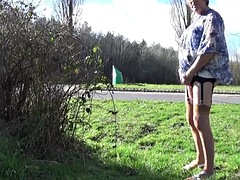 Transvestite crossdresser dildos in front of the castle outd