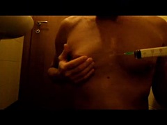Saline injection into the breasts