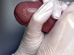 Super close-up handjob in white latex gloves with commentary